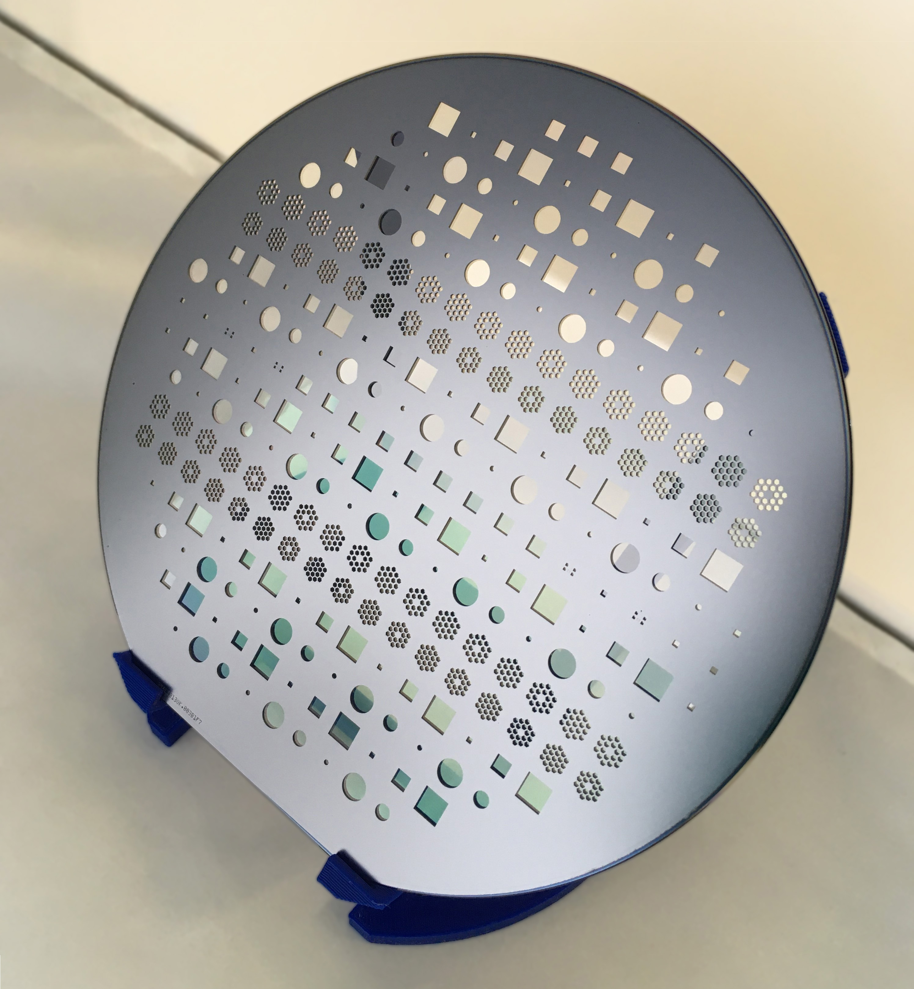 Free and intact GaN membranes on a Si carrier wafer. Free and intact GaN membranes on a Si carrier wafer.